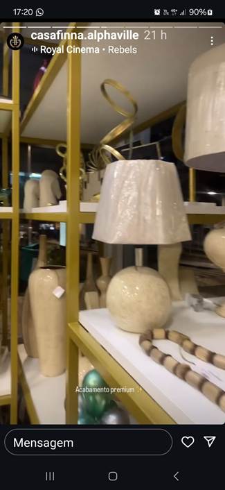 A white lamp on a shelf

Description automatically generated